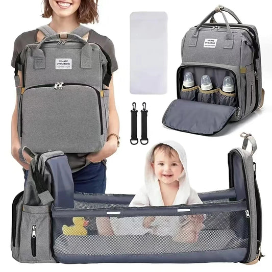Foldable bed diaper bag with changing station insulated pocket and