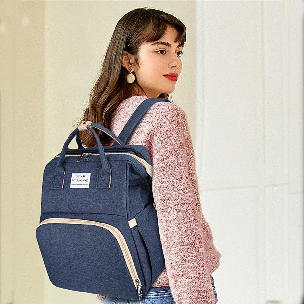 Foldable bed diaper bag with changing station insulated pocket and